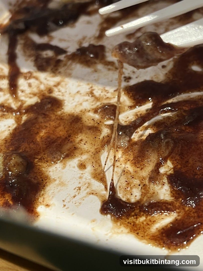Dirty Plate with Food Scraps