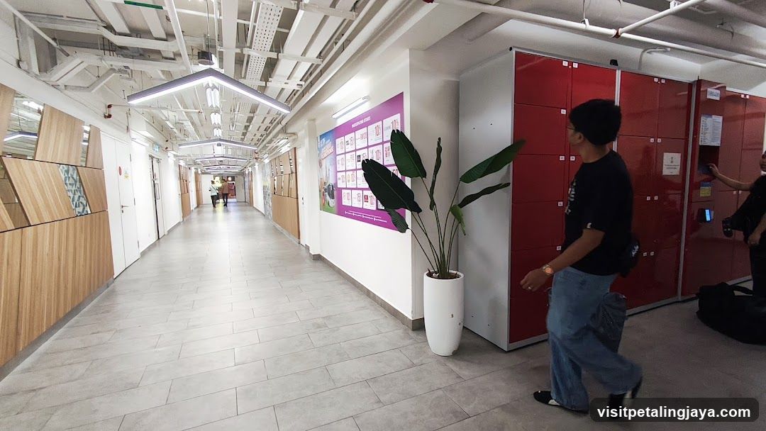 Hallway with Red Lockers and Display Board