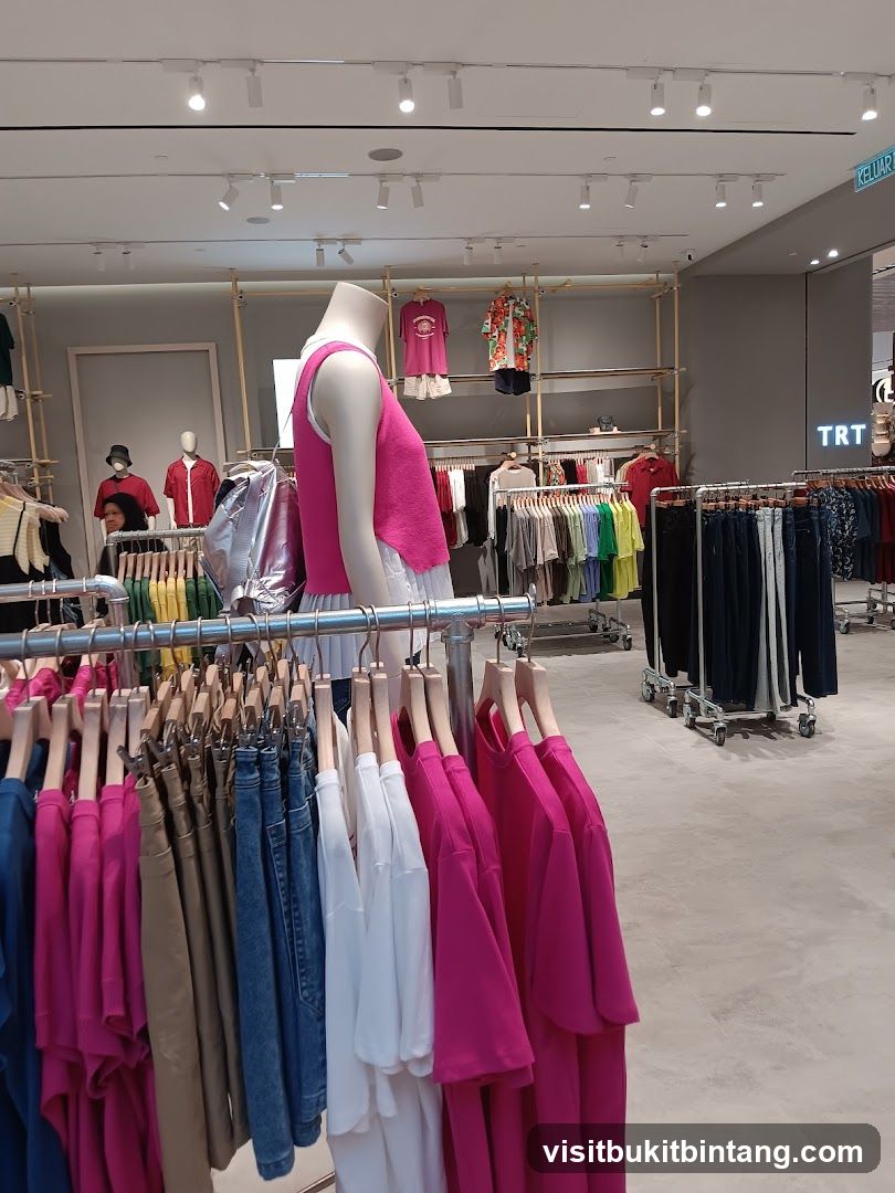 Clothing store interior with mannequins and racks of clothes