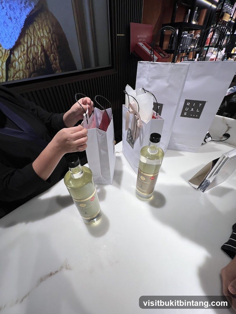 Shopping bags and bottles on a table