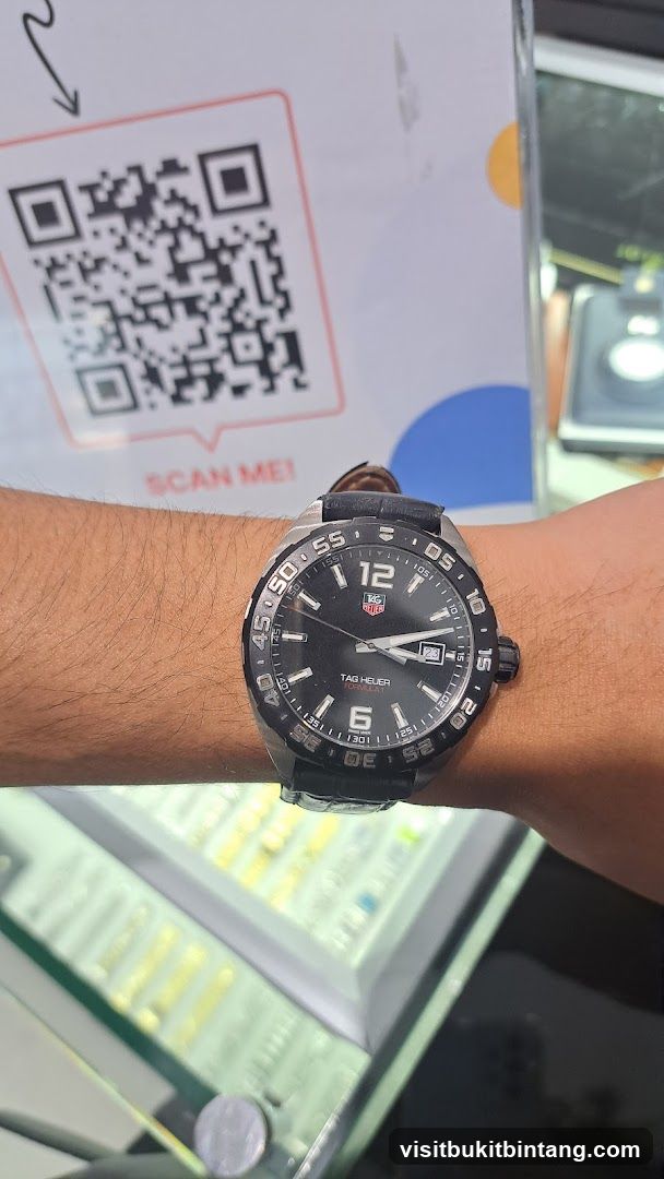 Watch on wrist with QR code