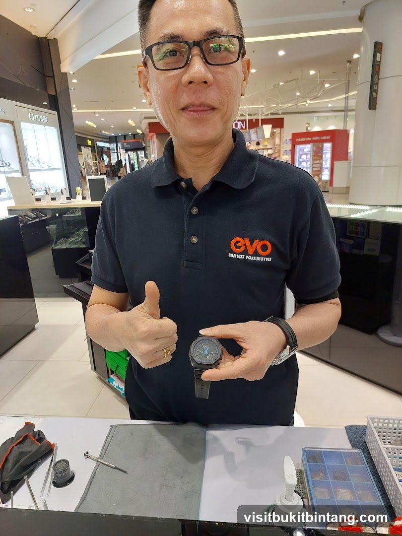 Man holding a watch