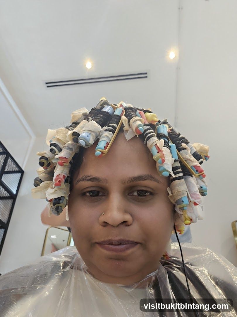 Woman with hair rollers