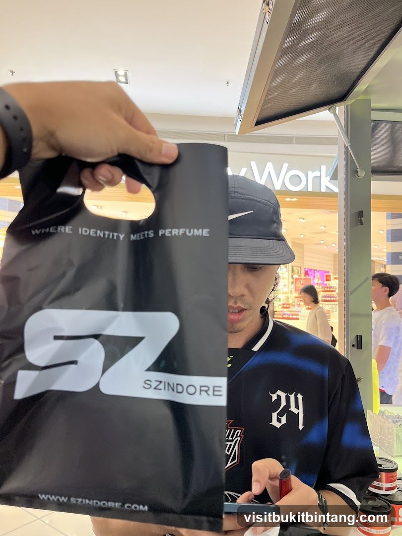 Person holding a shopping bag