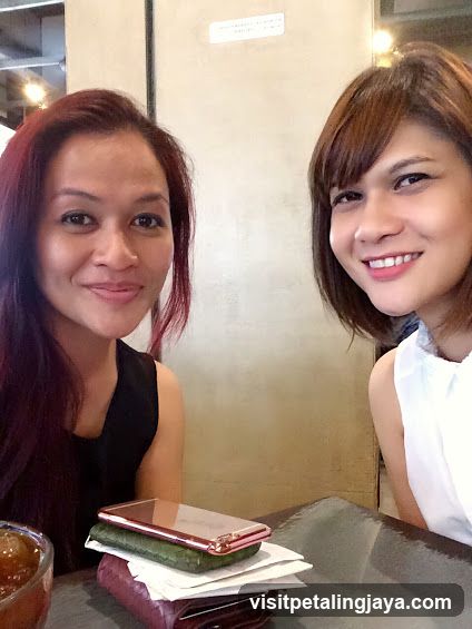 Two women at a cafe table