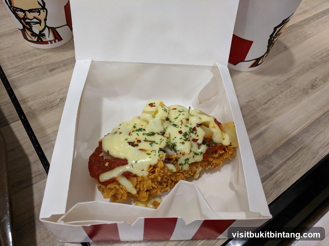 Fried chicken with cheese and sauce
