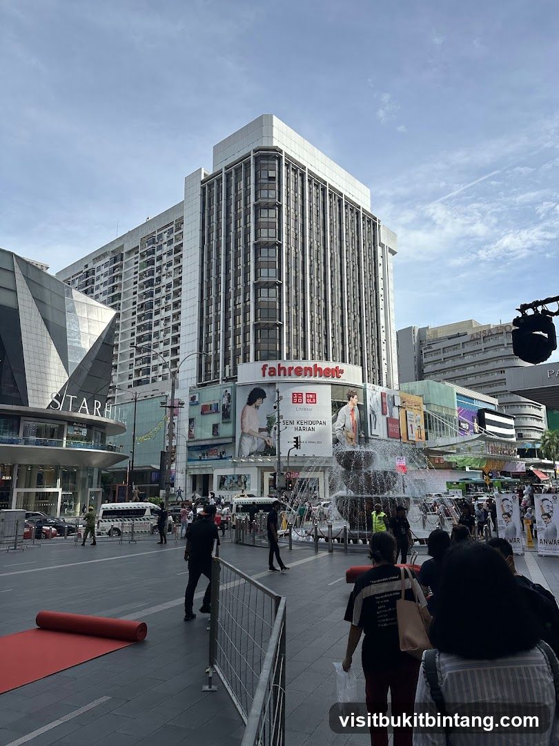 Fahrenheit Building with Fountain and Advertisements