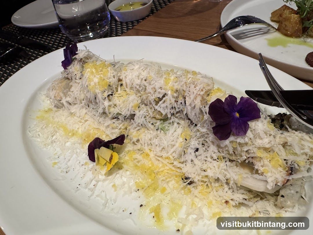 Gourmet Dish with Grated Cheese and Edible Flowers