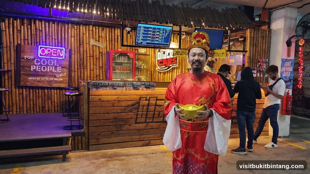 Man in Traditional Chinese Attire at a Food Stall
