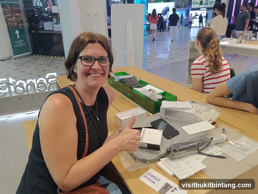 Woman giving a thumbs up with new purchases