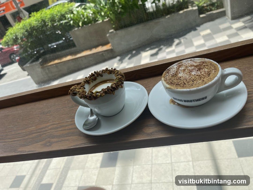 Two coffees on a windowsill