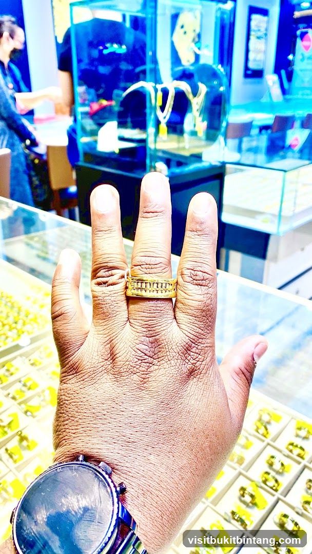 Hand with Ring in Jewelry Store