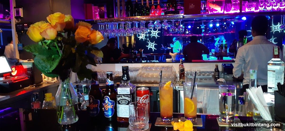 Bar Interior with Drinks and Flowers