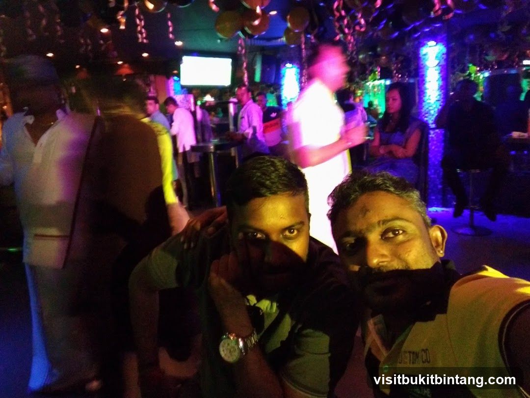 People in a dimly lit club