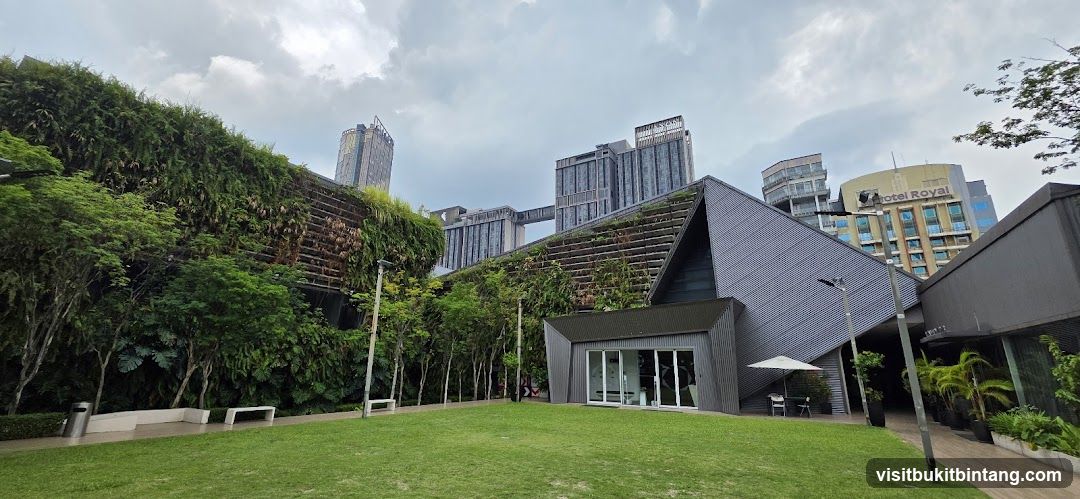 Modern Building with Green Wall and Cityscape