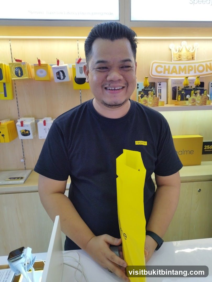Man holding a yellow bag in a store