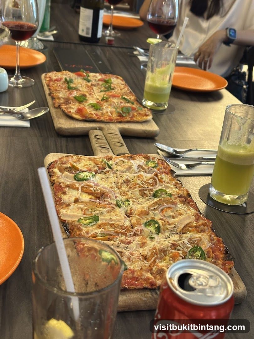 Pizzas and Drinks on Table