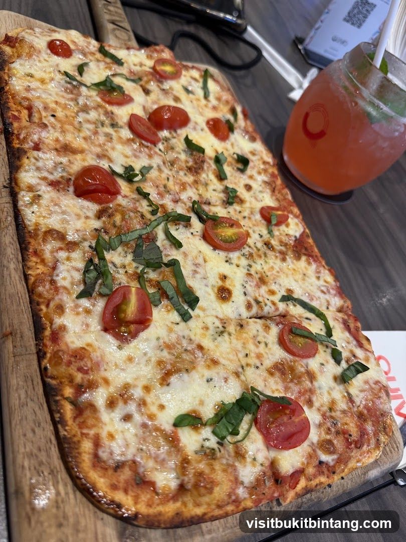 Rectangular Pizza with Cherry Tomatoes and Basil