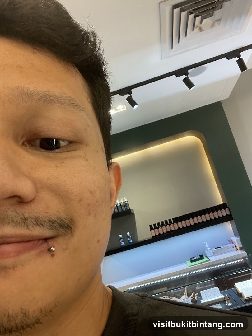 Man with lip piercing