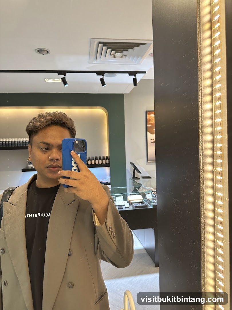 Man taking a mirror selfie in a store
