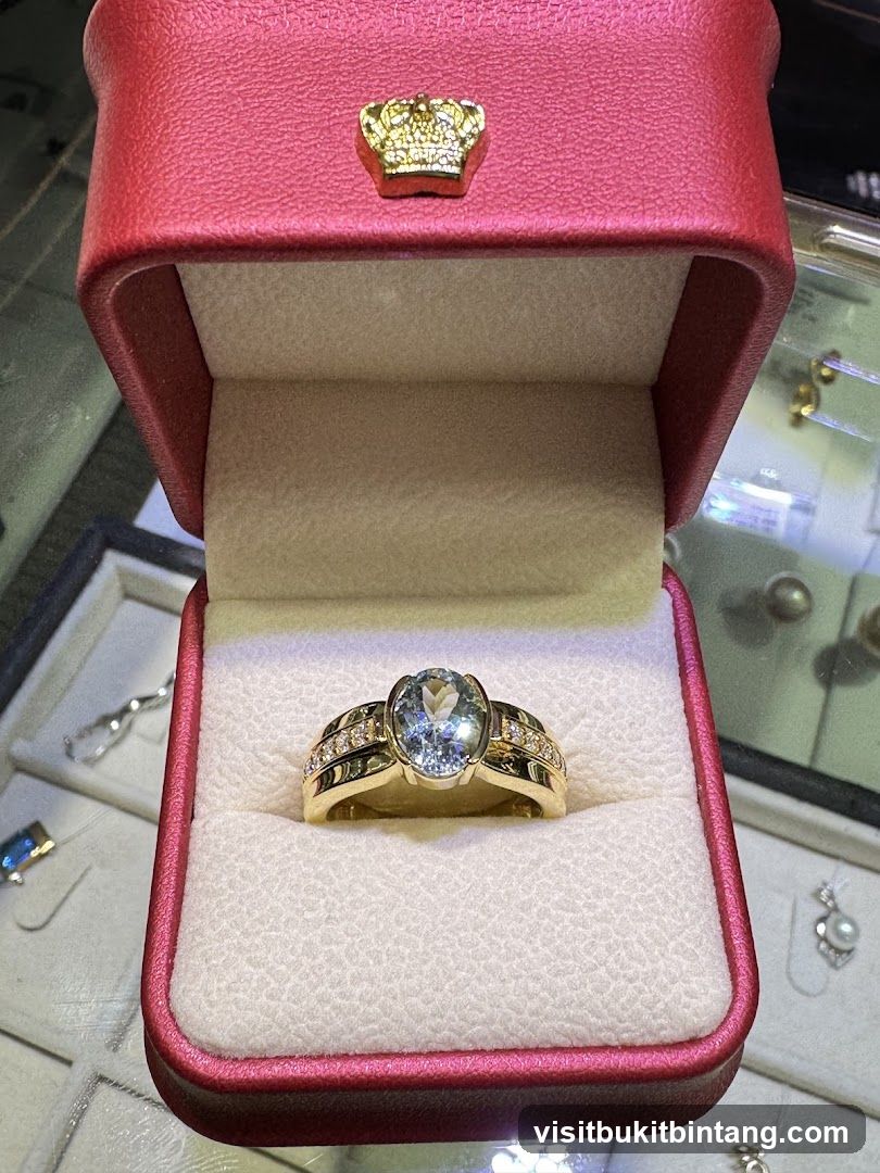 Gold ring with aquamarine and diamonds