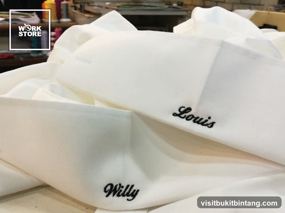 Embroidered Names on White Fabric