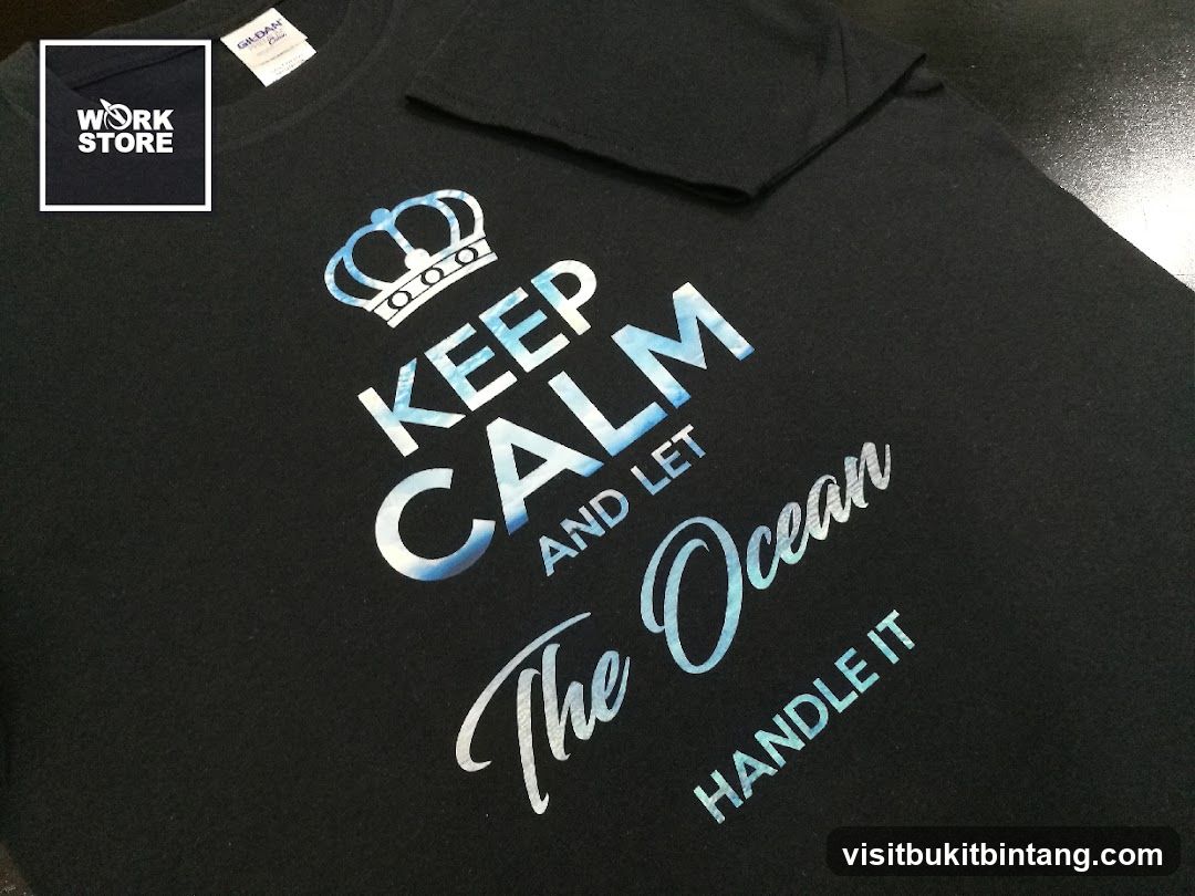 Black T-shirt with "Keep Calm and Let The Ocean Handle It" slogan