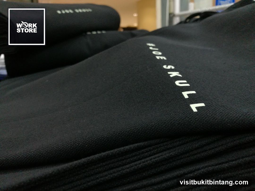 Black fabric with white text