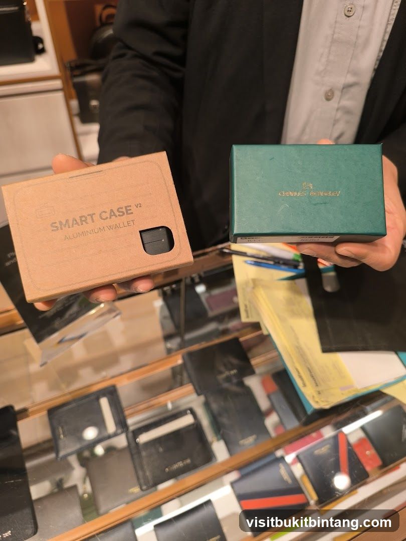 Person holding wallet packaging