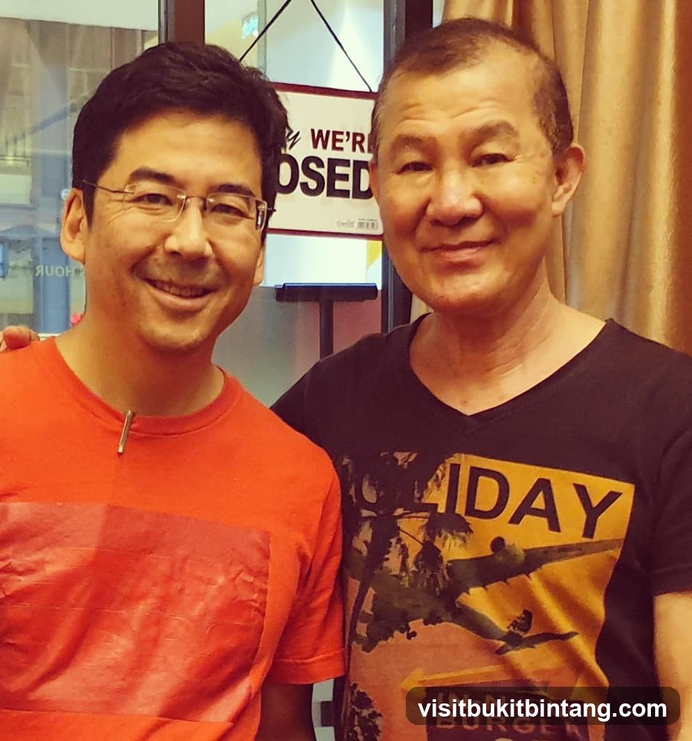 Two men posing for a photo