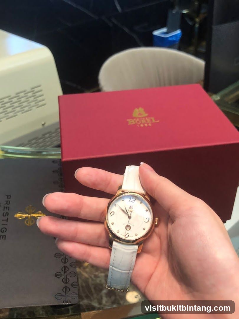 Woman holding a watch