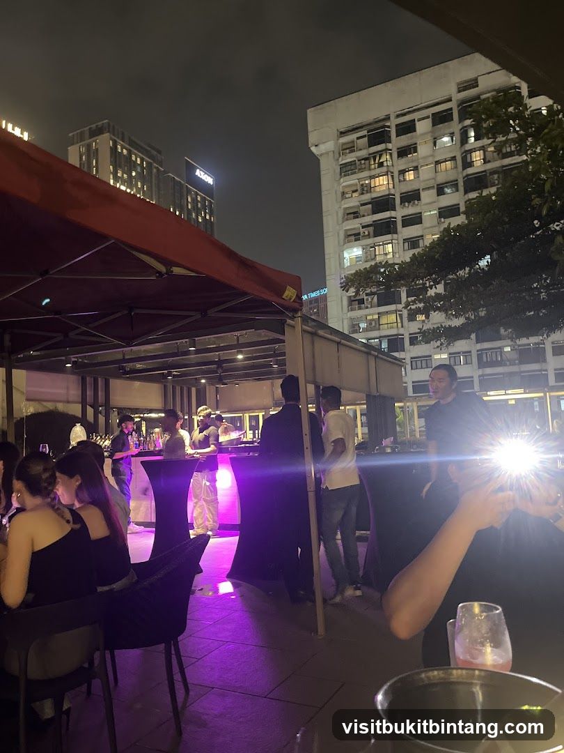 Outdoor gathering with people and buildings at night