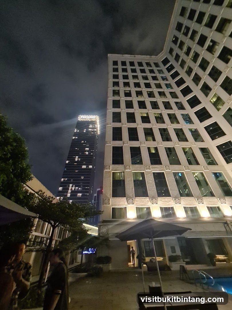 Night view of modern buildings and outdoor seating