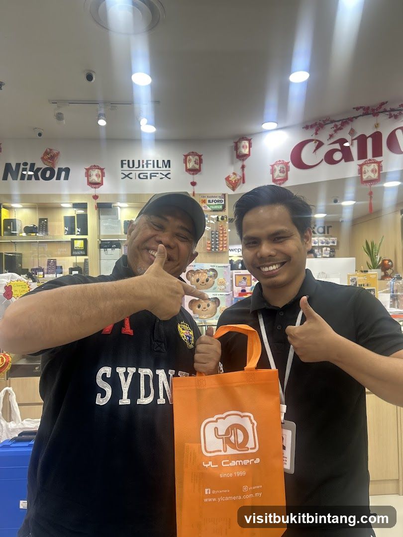 Two men posing with a shopping bag