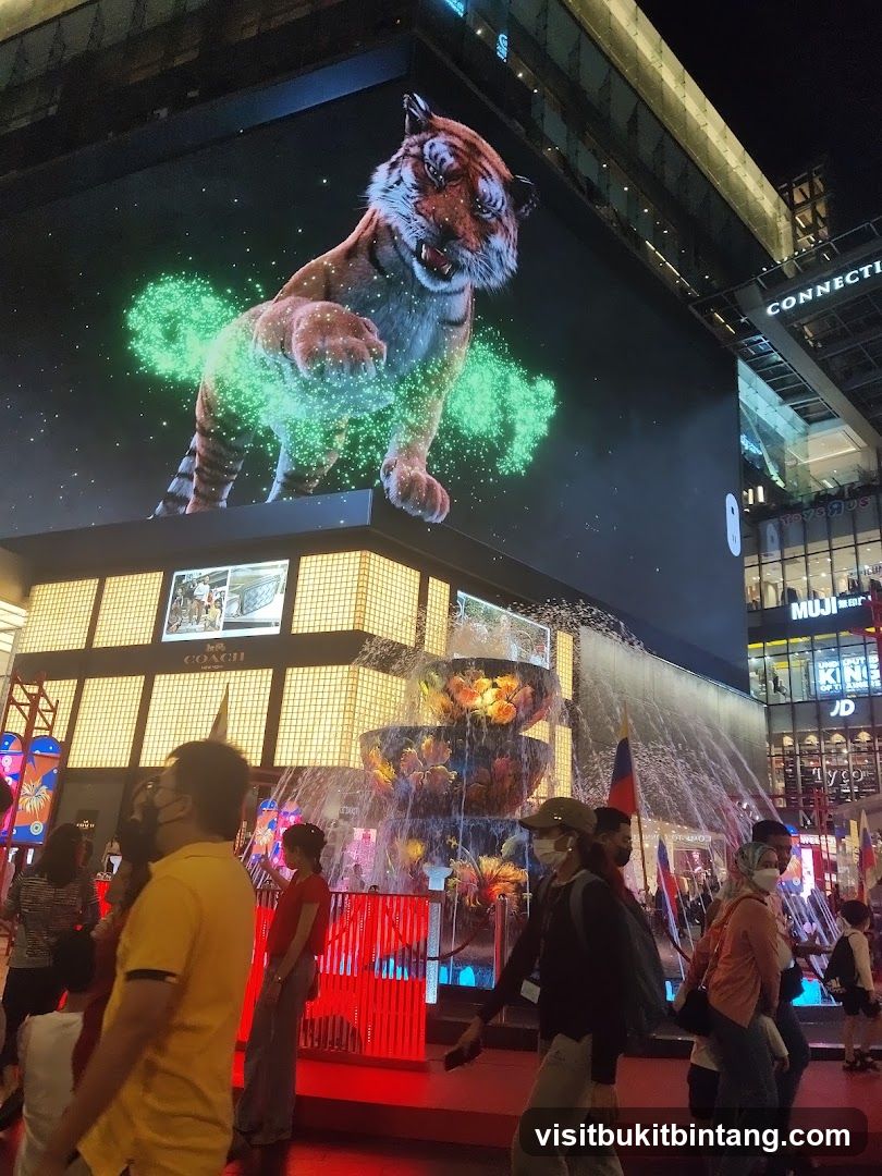 Digital Tiger Advertisement Above Fountain