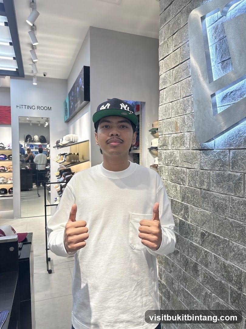 Man in a Hat Giving Thumbs Up