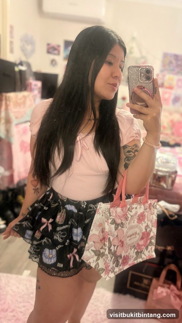Woman holding a floral tote bag