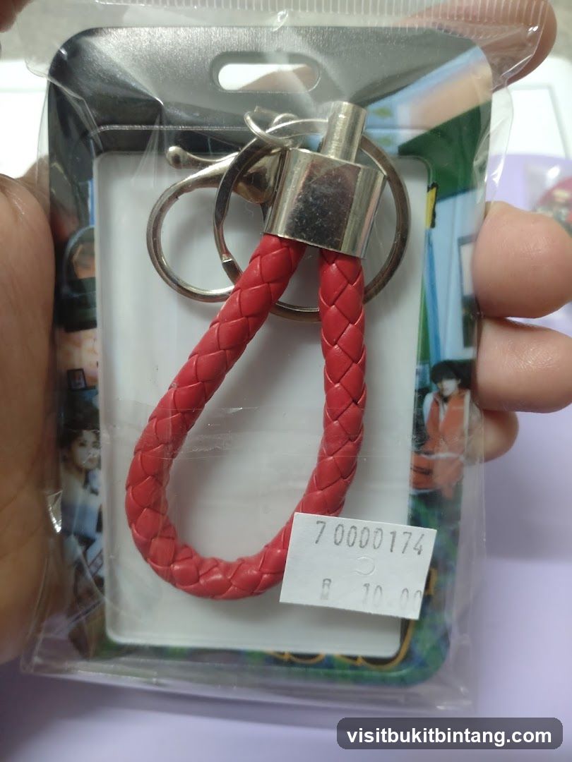 Keychain with braided red strap