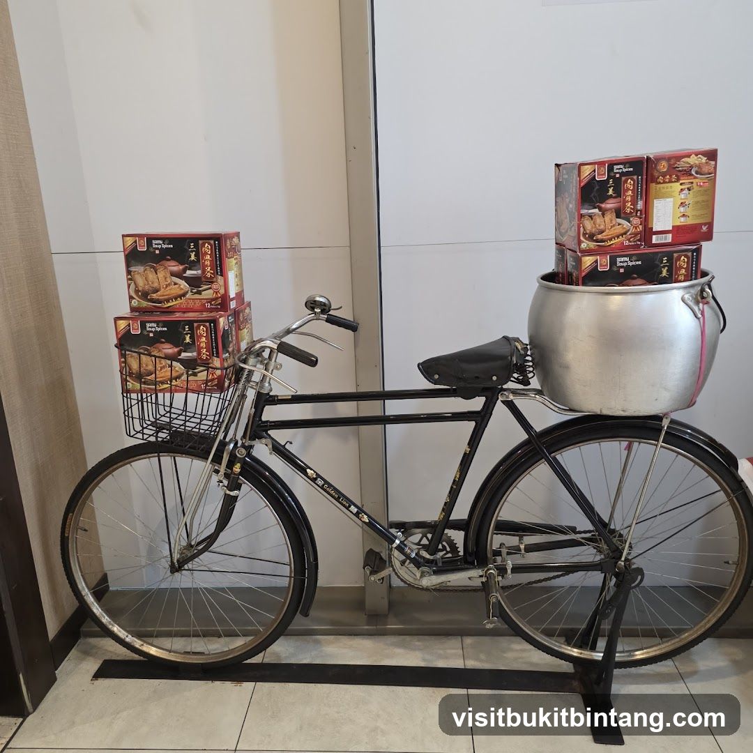 Bicycle with product boxes and pot