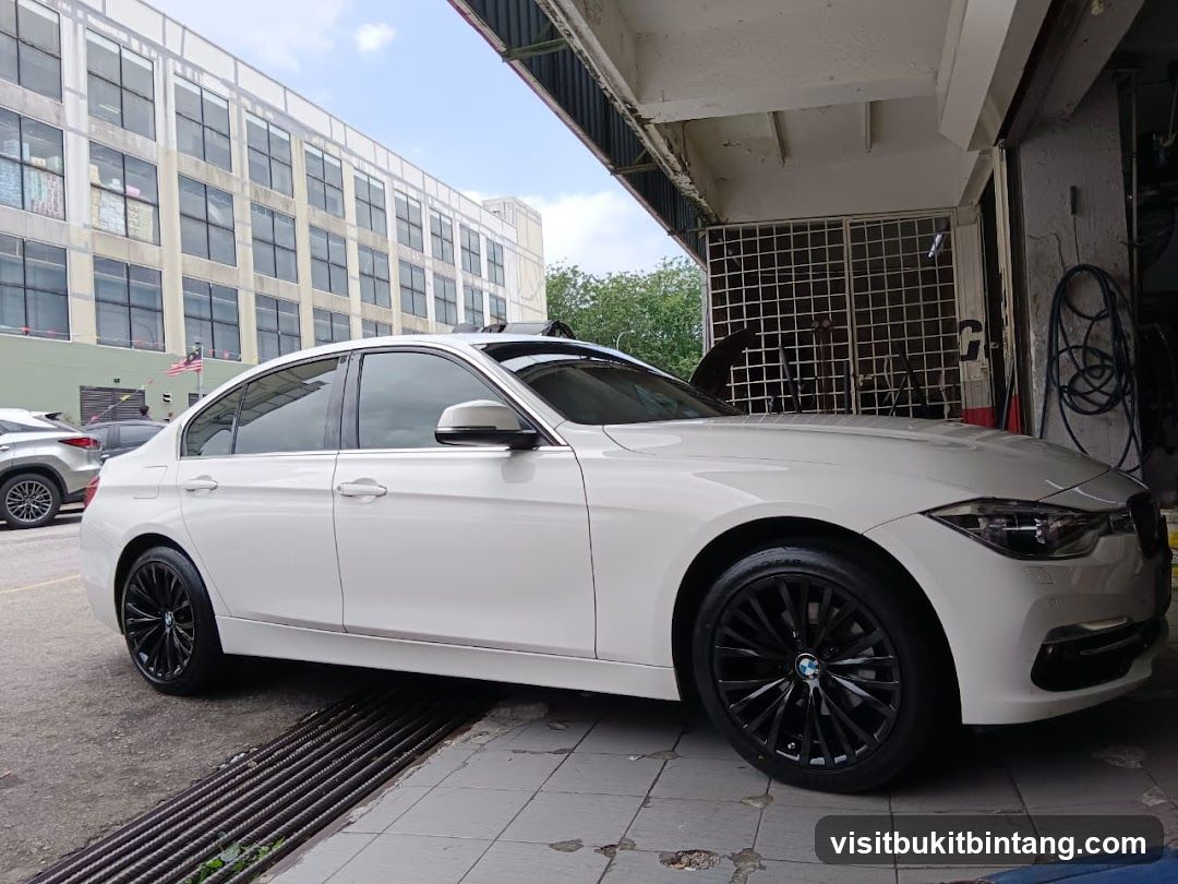 White BMW Sedan with Black Rims