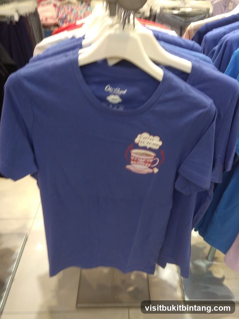 Blue T-shirt with coffee cup graphic