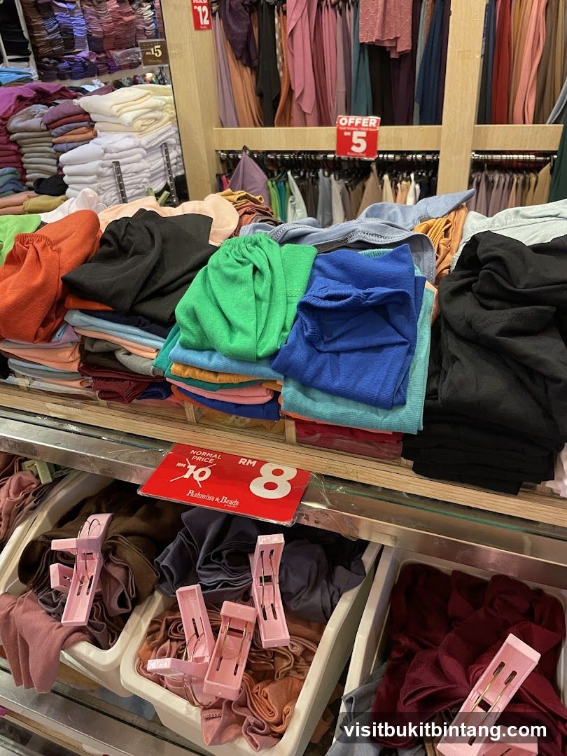 Clothing Display with Sale Signs