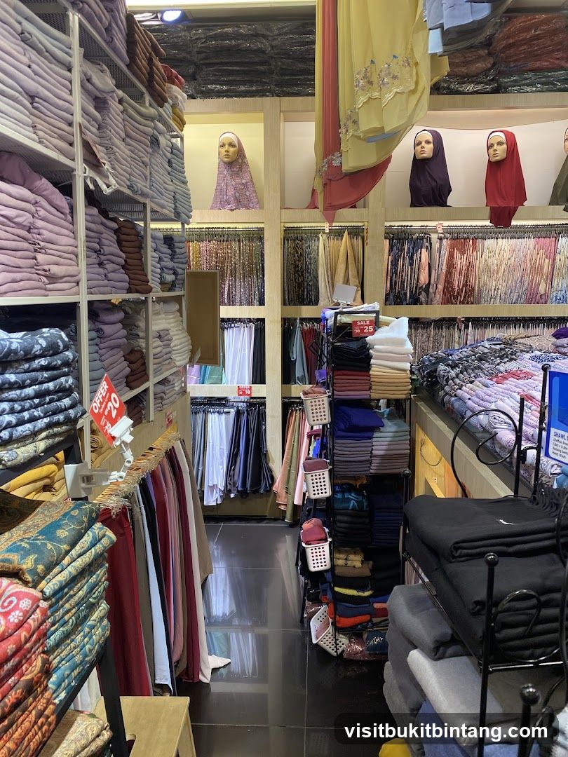Store interior with clothing displays