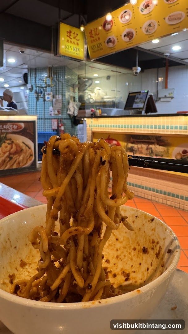 Noodles being lifted from a bowl