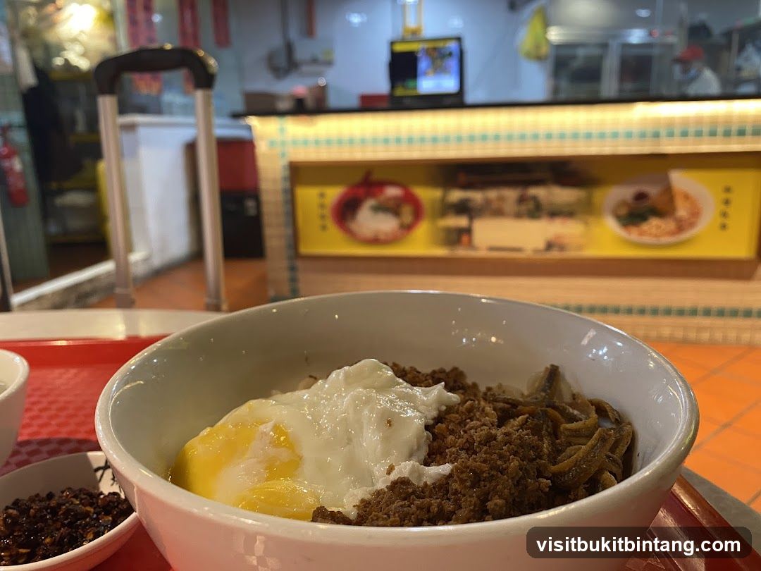 Bowl of food with a sunny-side up egg