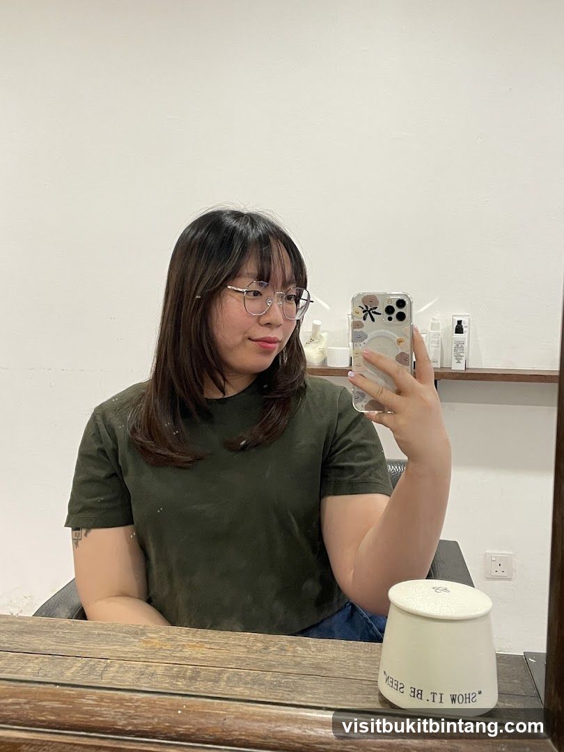 Woman taking a mirror selfie