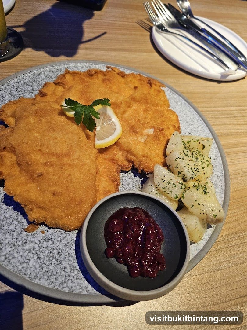 Schnitzel with Potatoes and Lingonberry Sauce