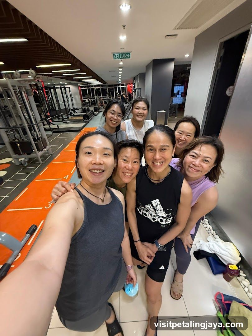 Group selfie in gym