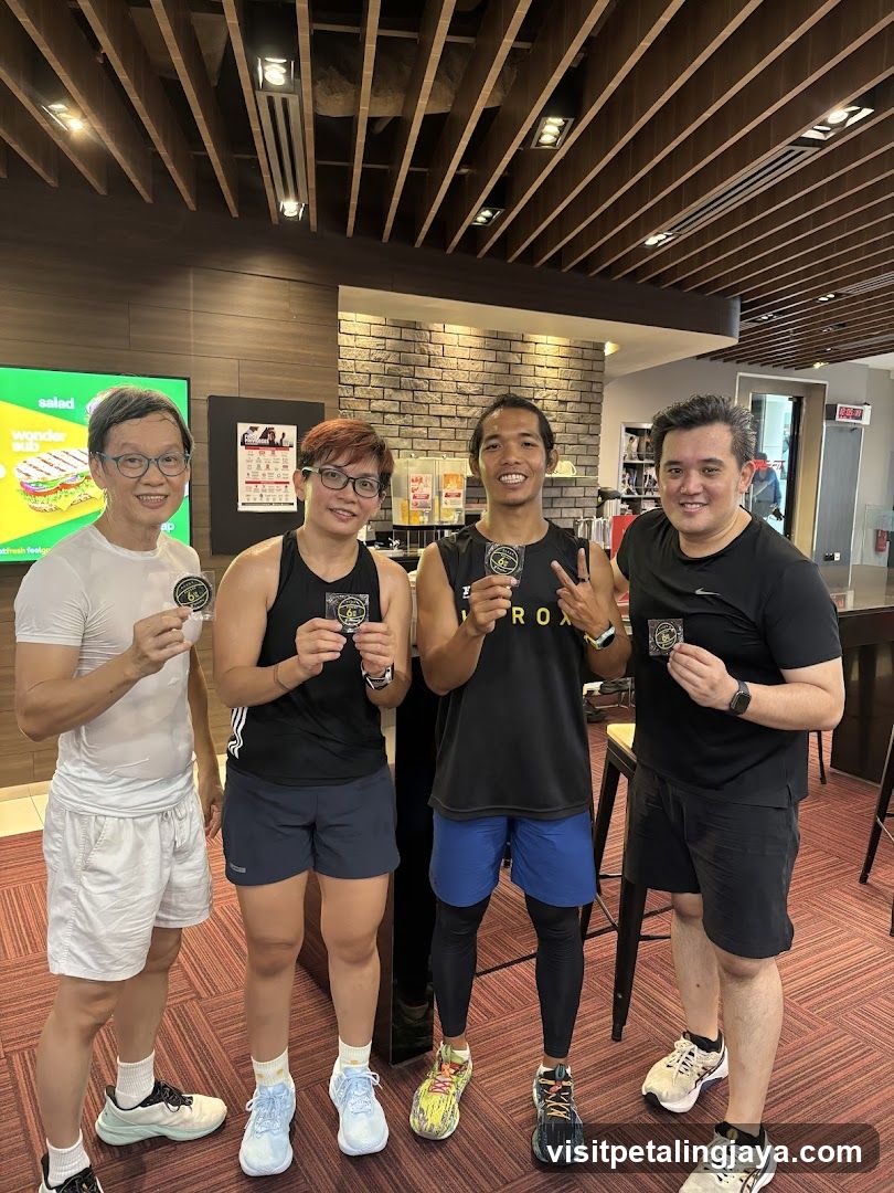Group of runners with medals indoors