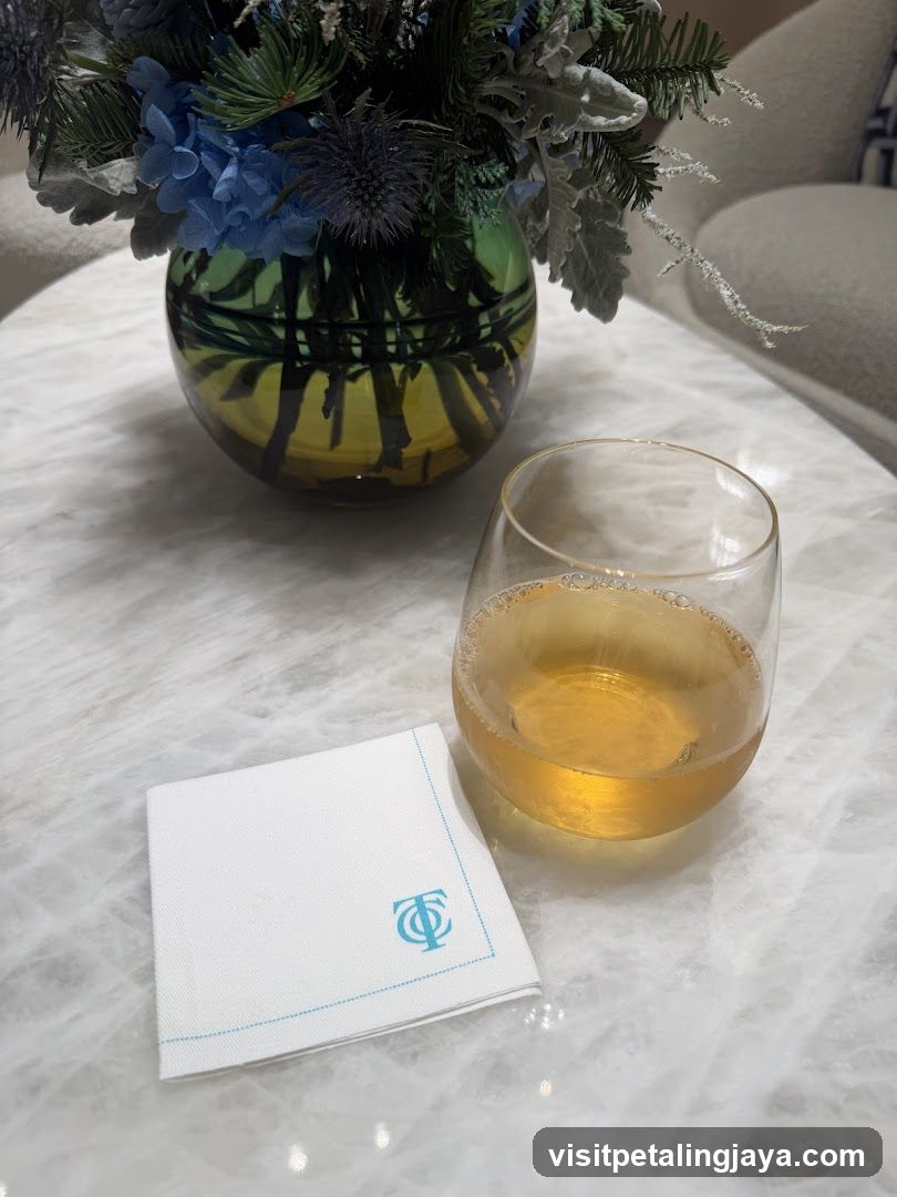 Drink and Flowers on Marble Table